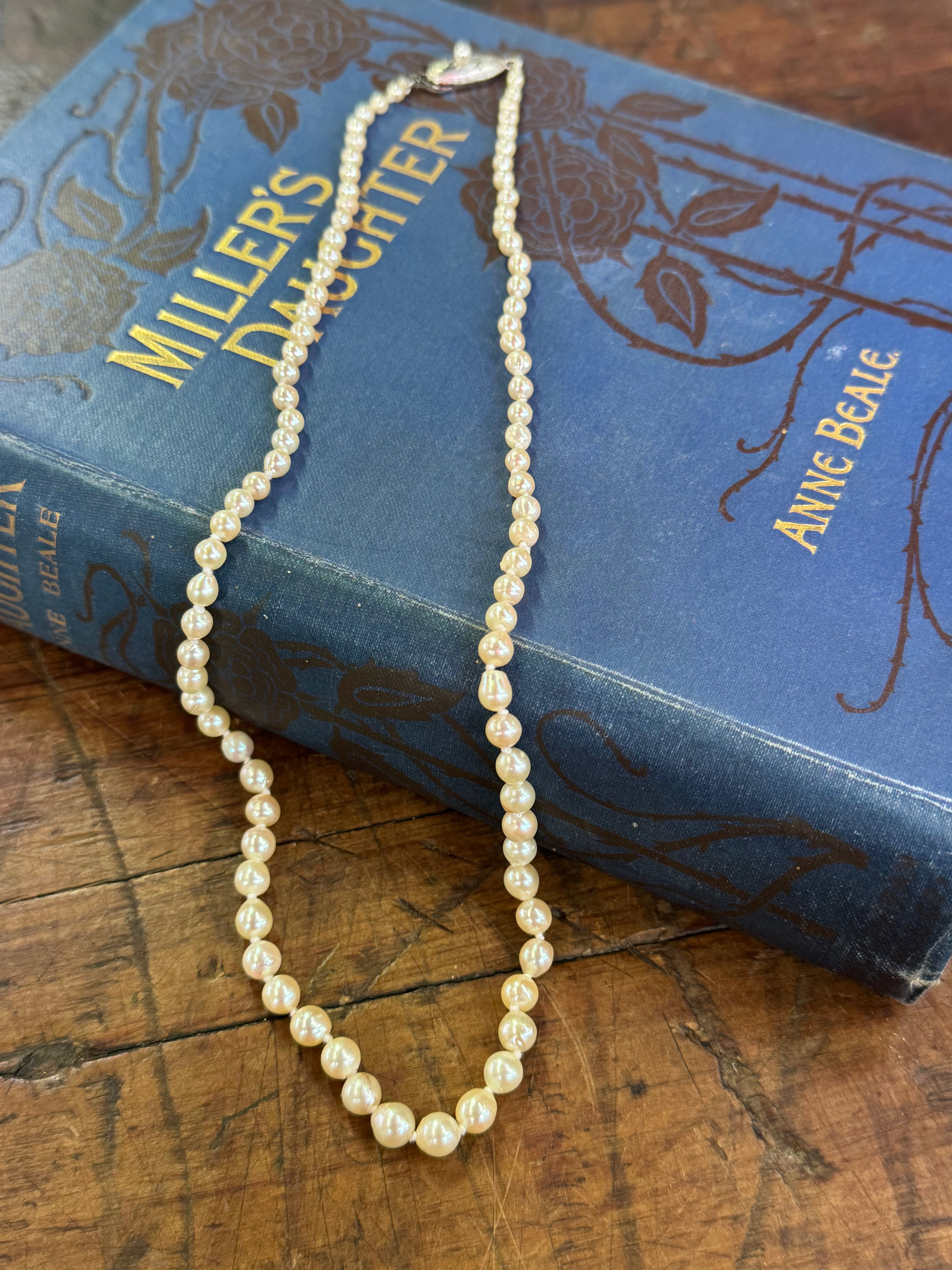 Sea Water Pearls Graduated 22.5cm Length Cream in colour Knotted