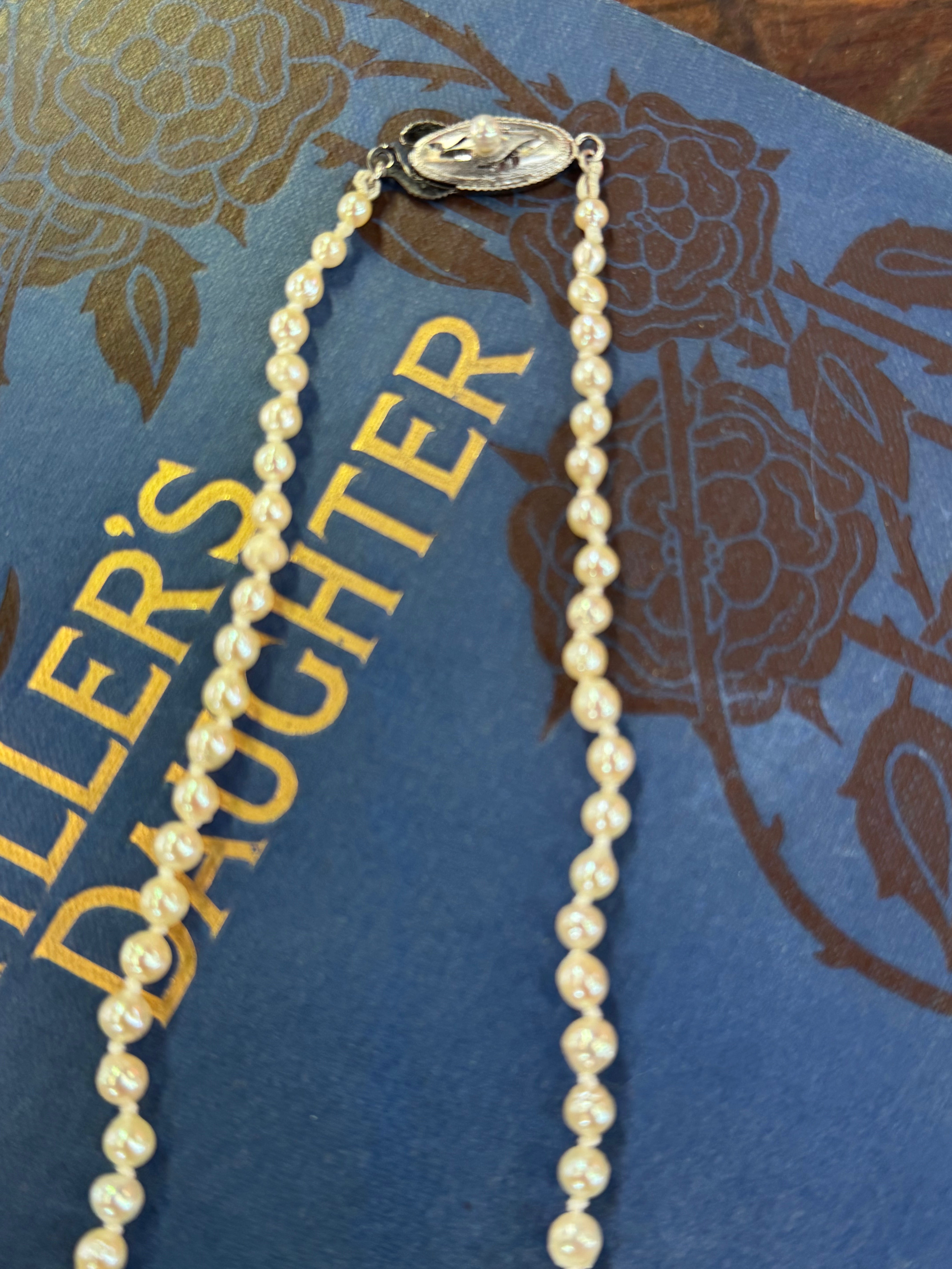 Sea Water Pearls Graduated 22.5cm Length Cream in colour Knotted