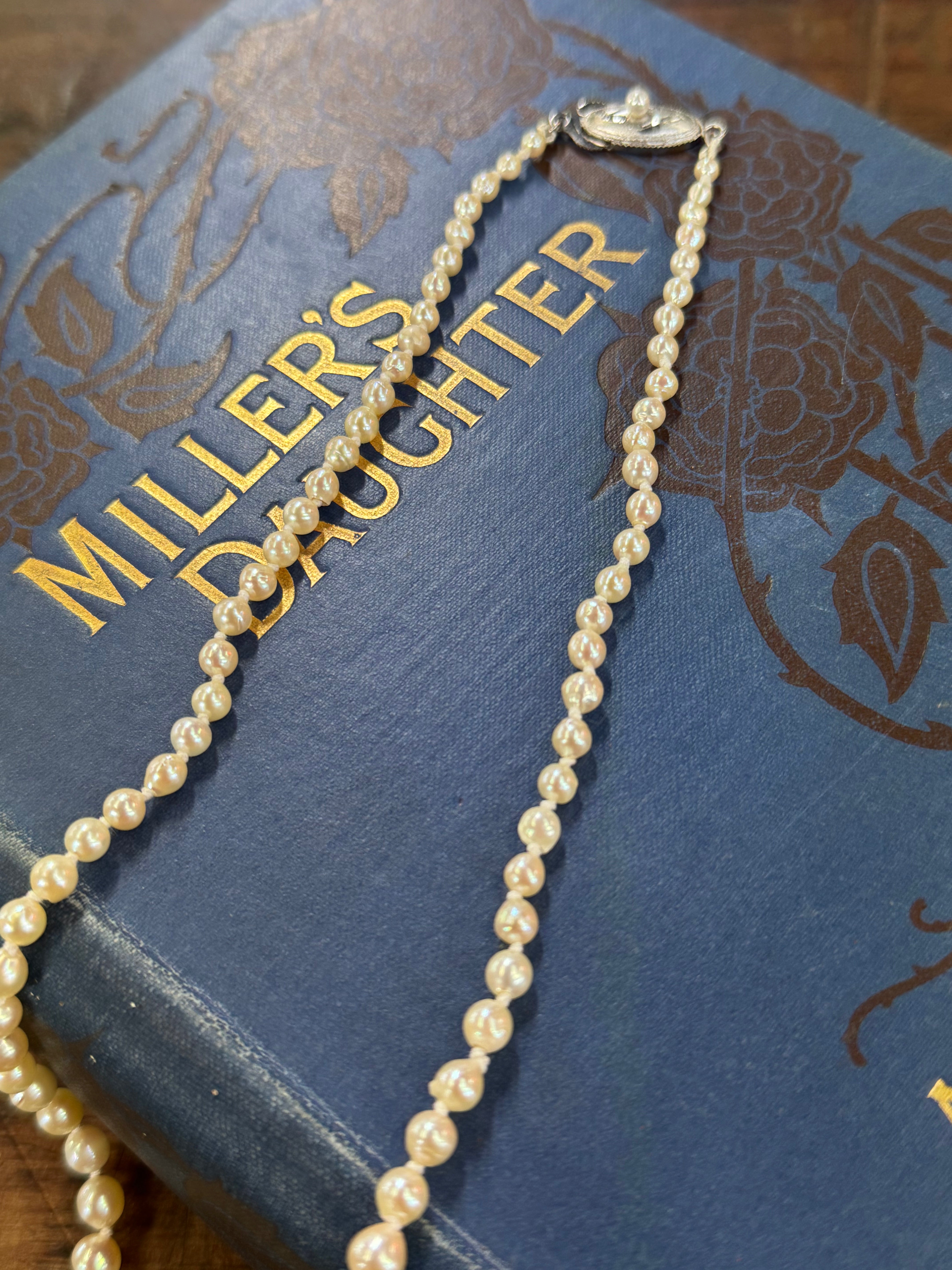 Sea Water Pearls Graduated 22.5cm Length Cream in colour Knotted
